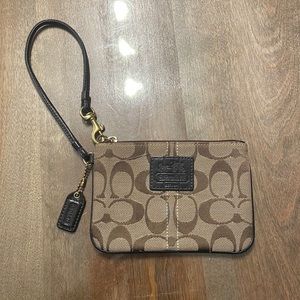 Black and Brown Coach Wristlet